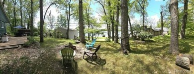 You truly can have it all!   Lakefront Luxury Meets Serene on Faulkwood Shores Golf Course in Michigan - for sale on GolfHomes.com, golf home, golf lot