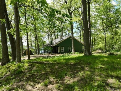 You truly can have it all!   Lakefront Luxury Meets Serene on Faulkwood Shores Golf Course in Michigan - for sale on GolfHomes.com, golf home, golf lot