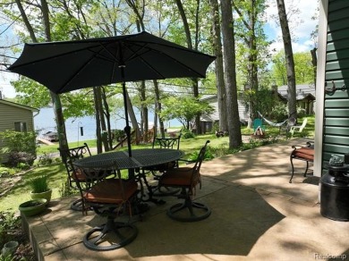 You truly can have it all!   Lakefront Luxury Meets Serene on Faulkwood Shores Golf Course in Michigan - for sale on GolfHomes.com, golf home, golf lot