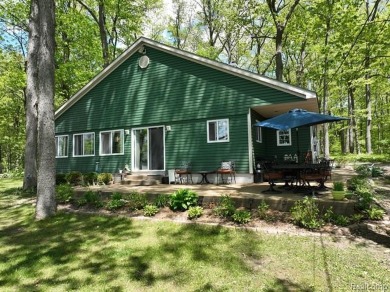 You truly can have it all!   Lakefront Luxury Meets Serene on Faulkwood Shores Golf Course in Michigan - for sale on GolfHomes.com, golf home, golf lot