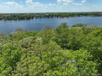 You truly can have it all!   Lakefront Luxury Meets Serene on Faulkwood Shores Golf Course in Michigan - for sale on GolfHomes.com, golf home, golf lot