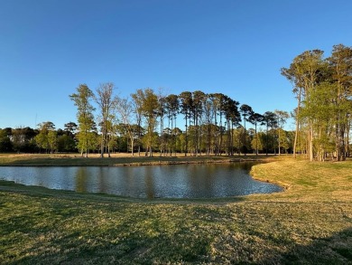 This beautiful golf and water view homesite is located in the on Bay Creek Golf Club in Virginia - for sale on GolfHomes.com, golf home, golf lot