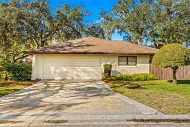 Welcome to a beautifully maintained 5-bedroom, 3-bath home on Temple Terrace Golf and Country Club in Florida - for sale on GolfHomes.com, golf home, golf lot