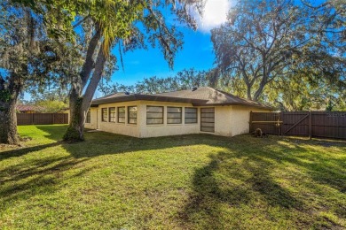 Welcome to a beautifully maintained 5-bedroom, 3-bath home on Temple Terrace Golf and Country Club in Florida - for sale on GolfHomes.com, golf home, golf lot