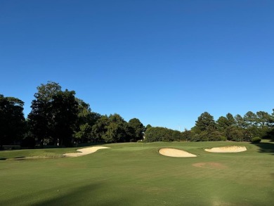 This beautiful wooded homesite, overlooking the ninth fairway on Bay Creek Golf Club in Virginia - for sale on GolfHomes.com, golf home, golf lot
