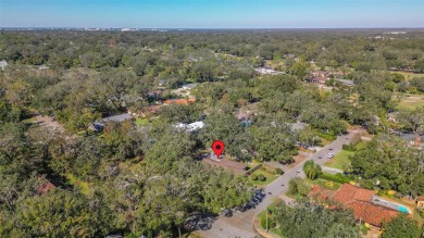 Welcome to a beautifully maintained 5-bedroom, 3-bath home on Temple Terrace Golf and Country Club in Florida - for sale on GolfHomes.com, golf home, golf lot