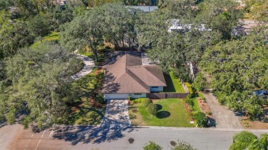 Welcome to a beautifully maintained 5-bedroom, 3-bath home on Temple Terrace Golf and Country Club in Florida - for sale on GolfHomes.com, golf home, golf lot