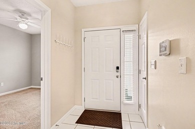 This beautifully updated condo combines comfort, style, and an on  in South Carolina - for sale on GolfHomes.com, golf home, golf lot