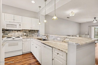 This beautifully updated condo combines comfort, style, and an on  in South Carolina - for sale on GolfHomes.com, golf home, golf lot