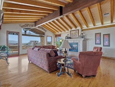 Spectacular Old World Tuscan-Inspired Estate in Redlands Mesa on The Golf Club At Redlands Mesa in Colorado - for sale on GolfHomes.com, golf home, golf lot