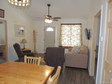 Just pack your bags and move right in to this immaculate totally on Nahma Club in Michigan - for sale on GolfHomes.com, golf home, golf lot
