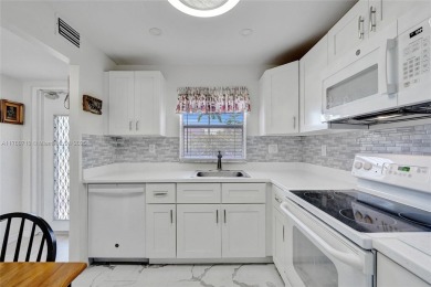 Stunning water & golf course views!  1-bed, 1.5-bath condo in on Sunrise Lakes Phase III in Florida - for sale on GolfHomes.com, golf home, golf lot