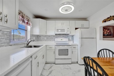 Stunning water & golf course views!  1-bed, 1.5-bath condo in on Sunrise Lakes Phase III in Florida - for sale on GolfHomes.com, golf home, golf lot