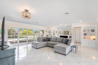 This charming 5-bedroom home offers a perfect blend of comfort on Atlantis Golf Club in Florida - for sale on GolfHomes.com, golf home, golf lot