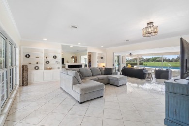 This charming 5-bedroom home offers a perfect blend of comfort on Atlantis Golf Club in Florida - for sale on GolfHomes.com, golf home, golf lot