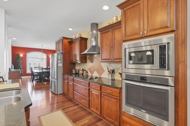 Stunning custom Cape Cod style home in a sought-after lake and on Harbor Hills Country Club in Ohio - for sale on GolfHomes.com, golf home, golf lot