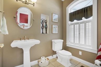 Stunning custom Cape Cod style home in a sought-after lake and on Harbor Hills Country Club in Ohio - for sale on GolfHomes.com, golf home, golf lot