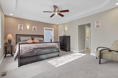 Stunning custom Cape Cod style home in a sought-after lake and on Harbor Hills Country Club in Ohio - for sale on GolfHomes.com, golf home, golf lot