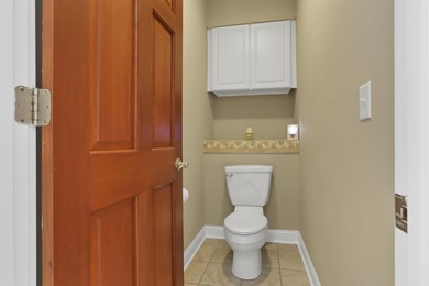 Stunning custom Cape Cod style home in a sought-after lake and on Harbor Hills Country Club in Ohio - for sale on GolfHomes.com, golf home, golf lot