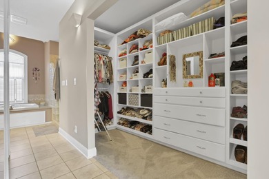 Stunning custom Cape Cod style home in a sought-after lake and on Harbor Hills Country Club in Ohio - for sale on GolfHomes.com, golf home, golf lot