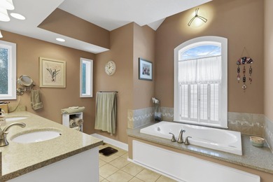 Stunning custom Cape Cod style home in a sought-after lake and on Harbor Hills Country Club in Ohio - for sale on GolfHomes.com, golf home, golf lot