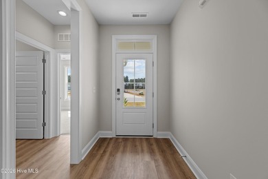 Just in time for spring! This new construction Oxford floor plan on Carolina Colours Golf Club in North Carolina - for sale on GolfHomes.com, golf home, golf lot