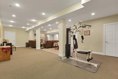 Stunning custom Cape Cod style home in a sought-after lake and on Harbor Hills Country Club in Ohio - for sale on GolfHomes.com, golf home, golf lot