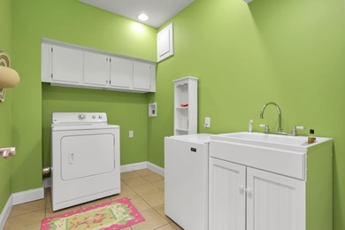 Stunning custom Cape Cod style home in a sought-after lake and on Harbor Hills Country Club in Ohio - for sale on GolfHomes.com, golf home, golf lot