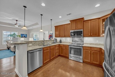 This 3 bedroom, 2 bath home in Compass Pointe offers over 1,600 on Compass Pointe Golf Course in North Carolina - for sale on GolfHomes.com, golf home, golf lot