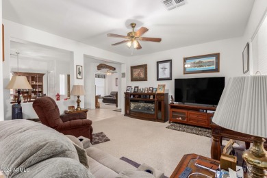 Discover vibrant living in this charming 2-bedroom, 2-bath + den on Springfield Golf Resort in Arizona - for sale on GolfHomes.com, golf home, golf lot