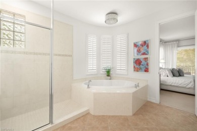 This exquisite property boasts beautiful neautral coastal decor on Tiburon Golf Club in Florida - for sale on GolfHomes.com, golf home, golf lot