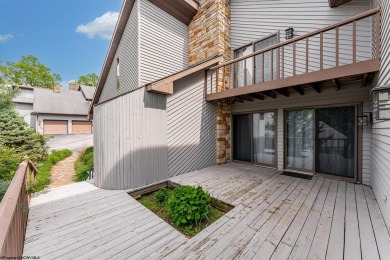 Welcome to this 2 bed, 3.5 bath contemporary end-unit townhome on Lakeview Golf Resort and Spa - Lakeview in West Virginia - for sale on GolfHomes.com, golf home, golf lot