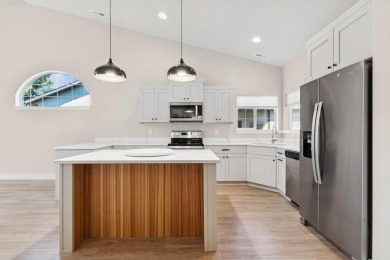 Experience easy living in this beautifully designed single-level on Village Greens Golf Club in Montana - for sale on GolfHomes.com, golf home, golf lot
