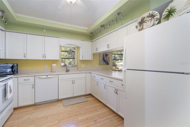 This beautifully furnished three-bedroom, two-bathroom on Capri Isle Golf Club in Florida - for sale on GolfHomes.com, golf home, golf lot