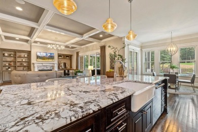 Experience luxury living in this stunning executive home located on MacGregor Downs Country Club in North Carolina - for sale on GolfHomes.com, golf home, golf lot