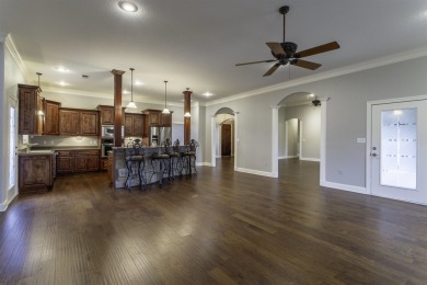 Stunning all-brick, single-level home in Ridgepointe overlooking on RidgePointe Country Club in Arkansas - for sale on GolfHomes.com, golf home, golf lot