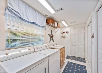 Beautifully updated and offered turnkey, this 3 bedroom, 2 baths on Windstar on Naples Bay in Florida - for sale on GolfHomes.com, golf home, golf lot