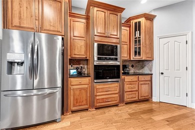 Tucked away on a quiet cul-de-sac in one of NWA's most on Shadow Valley Country Club in Arkansas - for sale on GolfHomes.com, golf home, golf lot