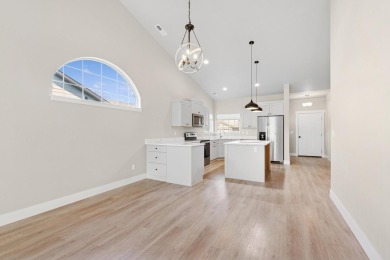 Experience easy living in this beautifully designed single-level on Village Greens Golf Club in Montana - for sale on GolfHomes.com, golf home, golf lot