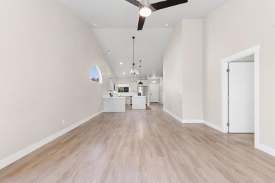 Experience easy living in this beautifully designed single-level on Village Greens Golf Club in Montana - for sale on GolfHomes.com, golf home, golf lot