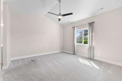 Experience easy living in this beautifully designed single-level on Village Greens Golf Club in Montana - for sale on GolfHomes.com, golf home, golf lot