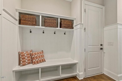 Experience luxury living in this stunning executive home located on MacGregor Downs Country Club in North Carolina - for sale on GolfHomes.com, golf home, golf lot