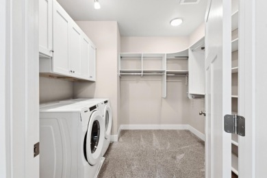 Experience easy living in this beautifully designed single-level on Village Greens Golf Club in Montana - for sale on GolfHomes.com, golf home, golf lot