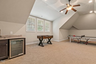 Experience luxury living in this stunning executive home located on MacGregor Downs Country Club in North Carolina - for sale on GolfHomes.com, golf home, golf lot