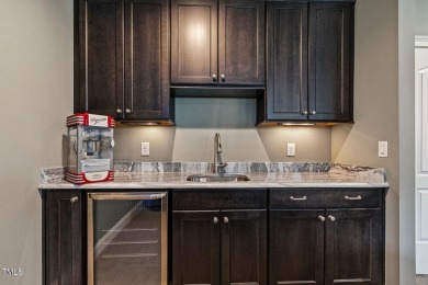 Experience luxury living in this stunning executive home located on MacGregor Downs Country Club in North Carolina - for sale on GolfHomes.com, golf home, golf lot