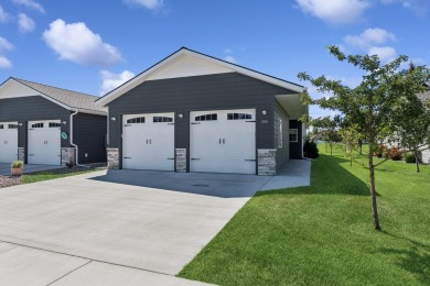 Experience easy living in this beautifully designed single-level on Village Greens Golf Club in Montana - for sale on GolfHomes.com, golf home, golf lot
