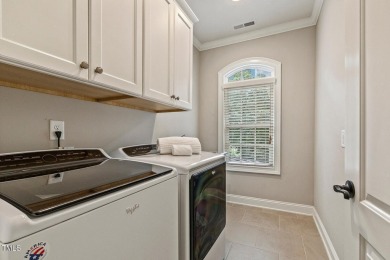 Experience luxury living in this stunning executive home located on MacGregor Downs Country Club in North Carolina - for sale on GolfHomes.com, golf home, golf lot