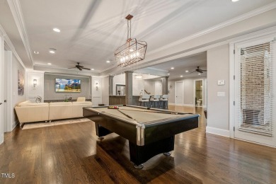 Experience luxury living in this stunning executive home located on MacGregor Downs Country Club in North Carolina - for sale on GolfHomes.com, golf home, golf lot