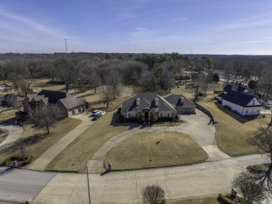 Stunning all-brick, single-level home in Ridgepointe overlooking on RidgePointe Country Club in Arkansas - for sale on GolfHomes.com, golf home, golf lot