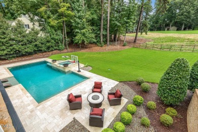 Experience luxury living in this stunning executive home located on MacGregor Downs Country Club in North Carolina - for sale on GolfHomes.com, golf home, golf lot